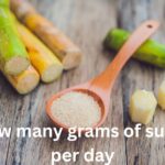 How many grams of sugar per day to lose weight for a woman